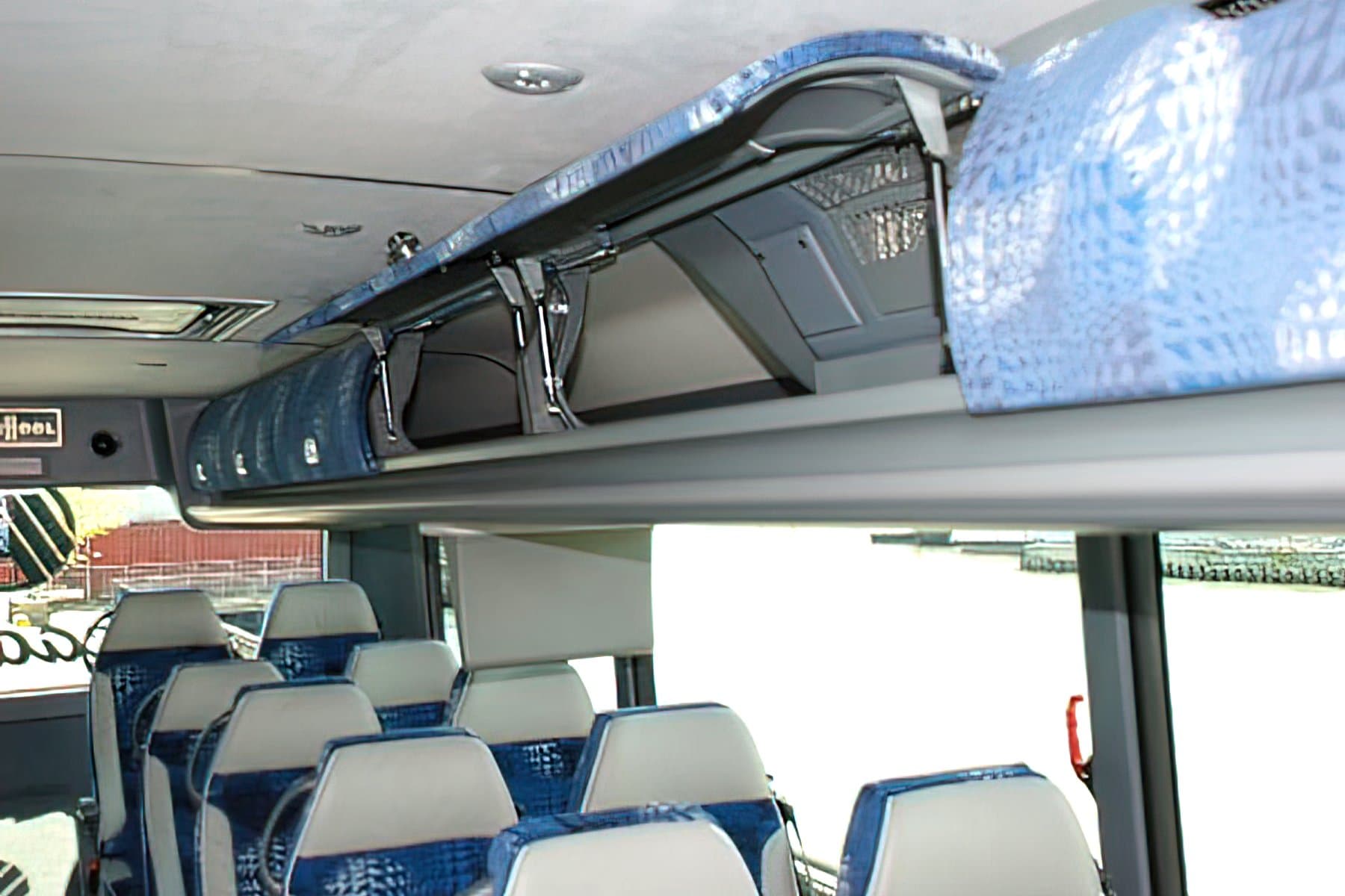38 Passenger Van Hool CX35 exterior 3